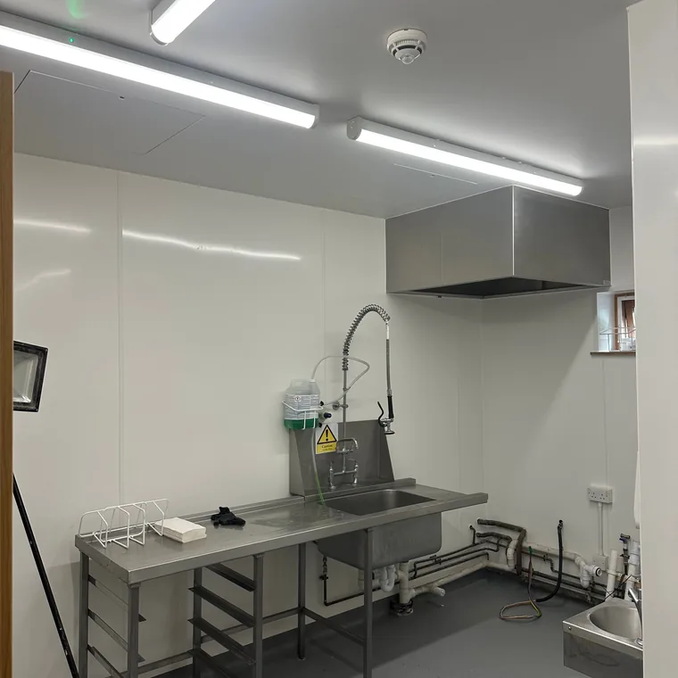Commercial kitchen lit with new LED batten fittings by HC Pyramid Electrical LTD