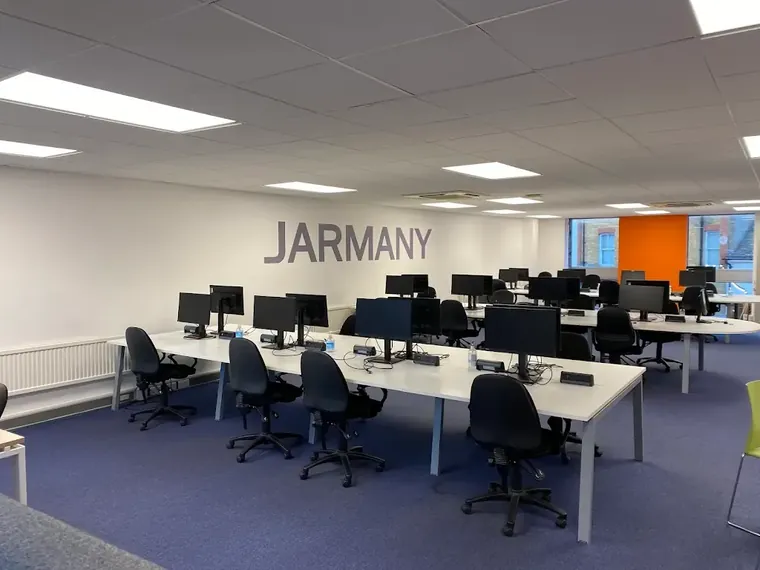 Open plan office lit with new LED panel lighting by HC Pyramid Electrical LTD