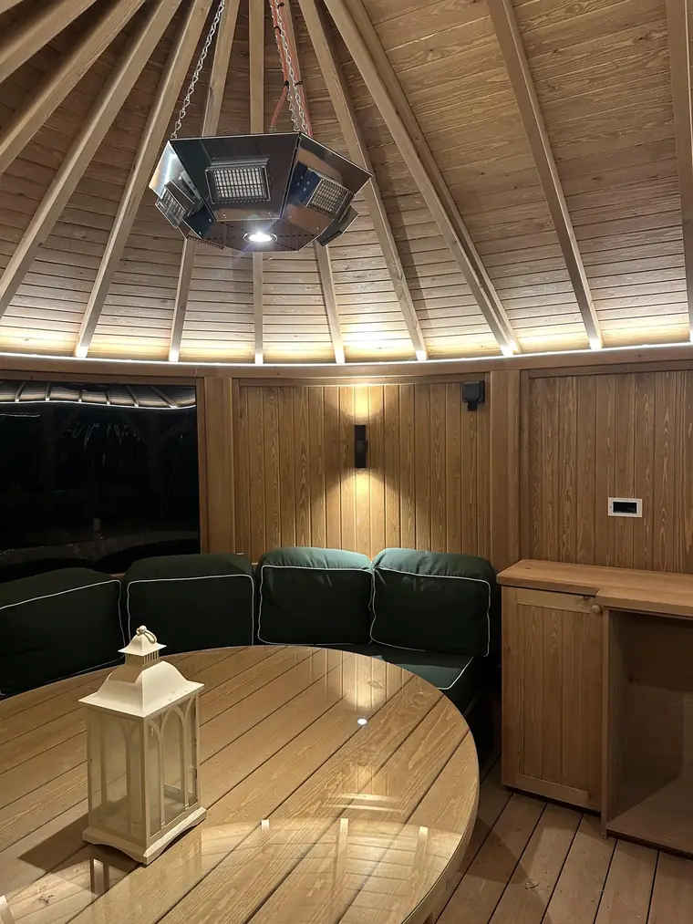 Garden pavilion lit with concealed LED rope lighting and wall lights by HC Pyramid Electrical LTD